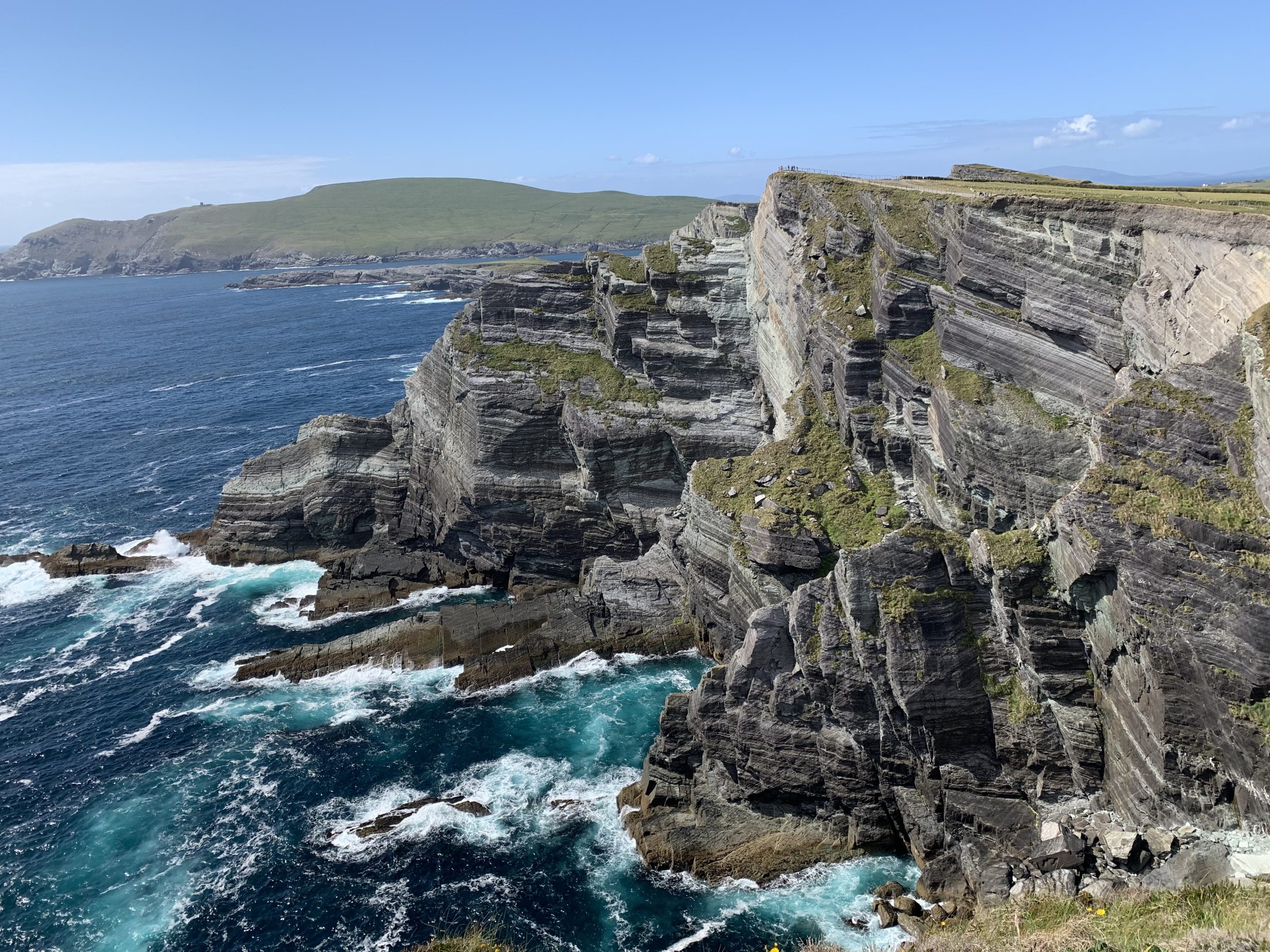 Wide view of the Kerry Cliffs on the Ring of Kerry coastal drive in Ireland
